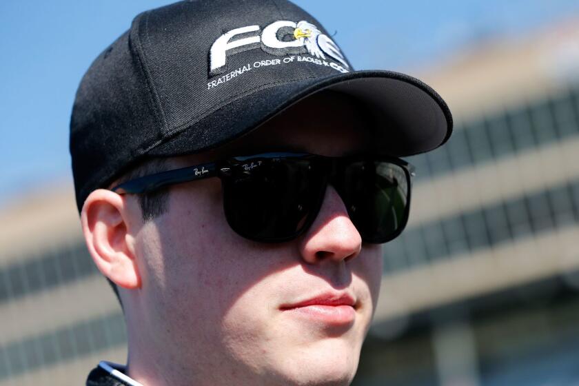 HAMPTON, GA - MARCH 04: Alex Bowman, driver of the #24 Fraternal Order of Eagles Chevrolet, stands on the grid during qualifying for the NASCAR Camping World Truck Series Active Pest Control 200 at Atlanta Motor Speedway on March 4, 2017 in Hampton, Georgia. (Photo by Brian Lawdermilk/Getty Images) ** OUTS - ELSENT, FPG, CM - OUTS * NM, PH, VA if sourced by CT, LA or MoD **