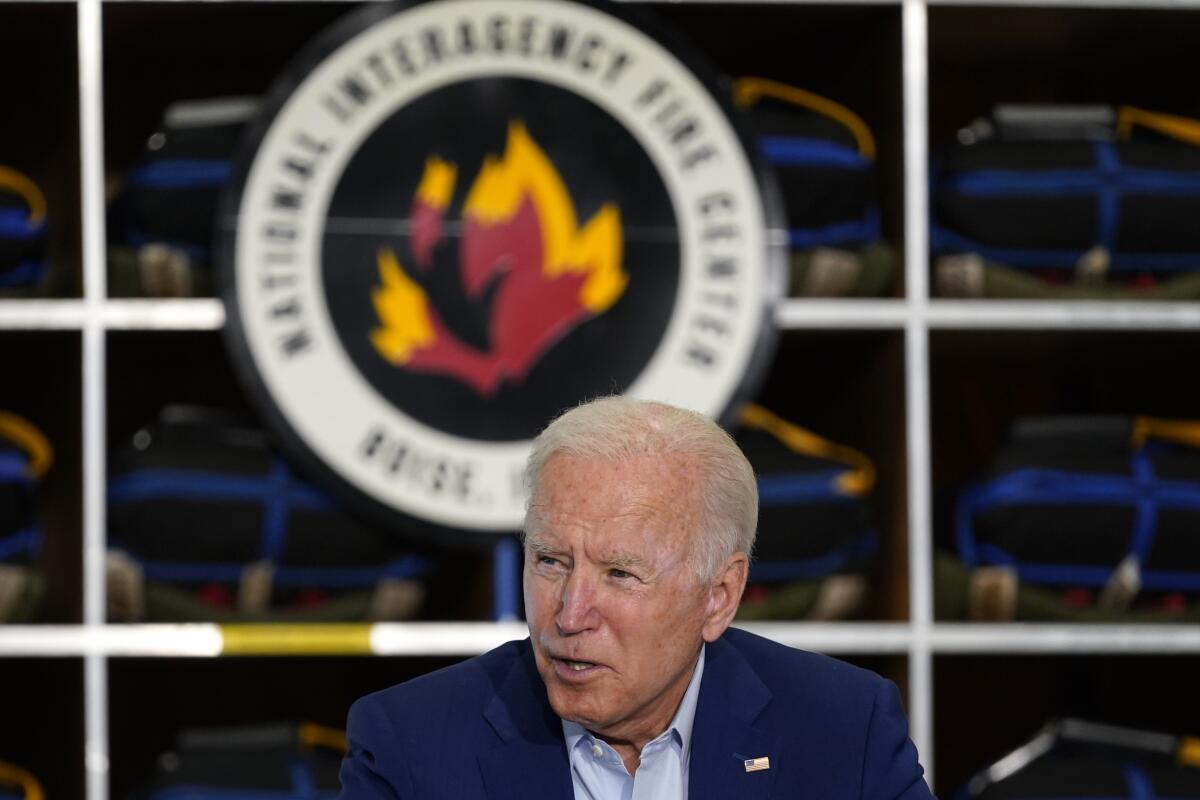 President Biden speaks during a visit to the National Interagency Fire Center