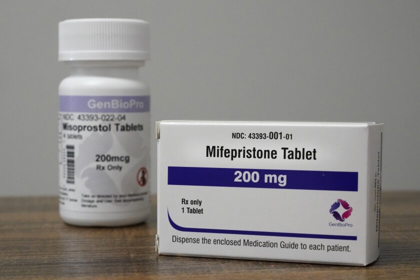 A packet of mifepristone and a bottle of misoprostol, a combination pill used to end early pregnancy.