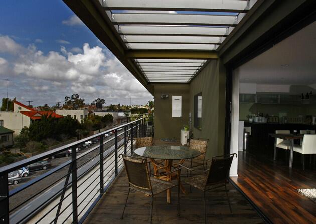 All the apartment terraces have sliding glass pocket doors, erasing the barrier between indoor and outdoor living spaces and helping to make the units feel larger than they are.