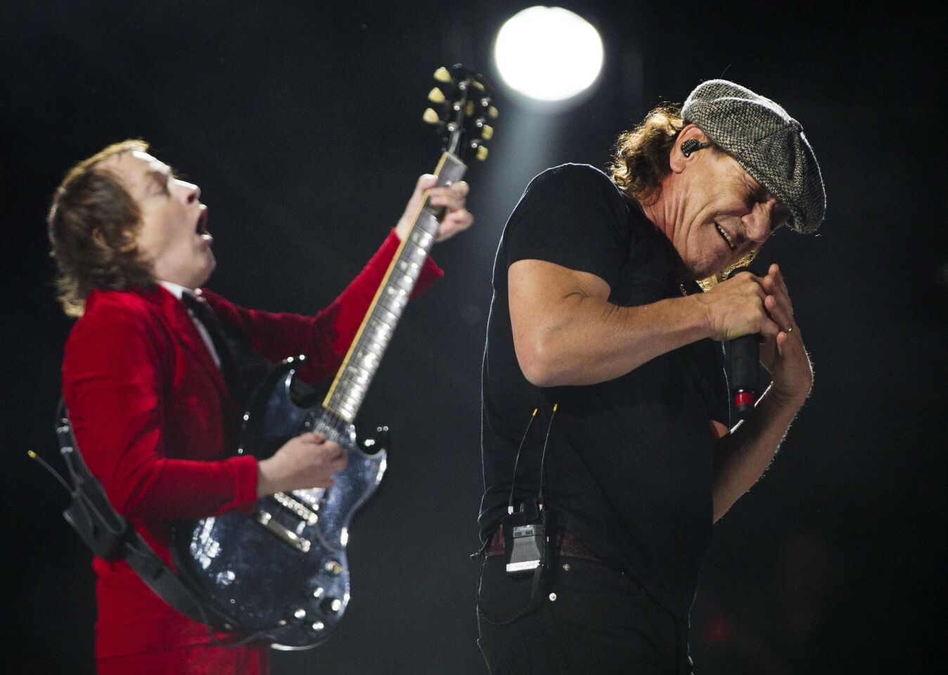 The 2015 Coachella Valley Music and Arts Festival gets underway. ACDC headlined the first night of the festival playing on the Coachella Stage to a huge audience. Guitarist Angus Young and Singer Brian Johnson during the bands set Friday night.