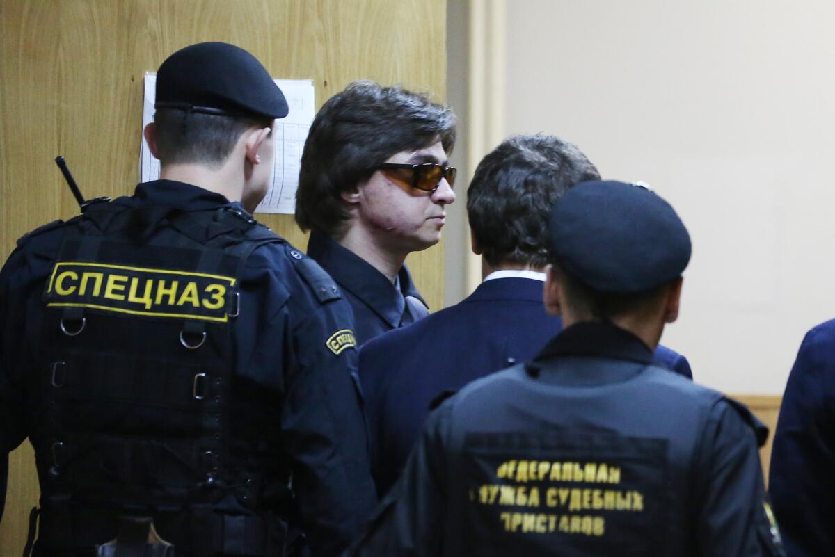 Bolshoi Theater ballet company artistic director Sergei Filin leaves the Meshchansky district court of Moscow Wednesday.