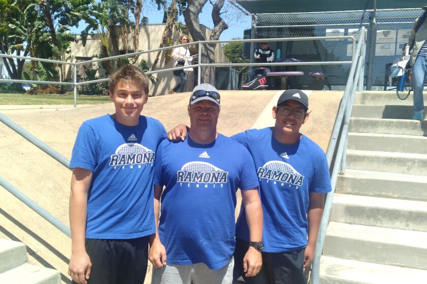 Ramona High tennis players Avery Baldridge, left, and Ricky Dinero, right, with coach John Zettenberg.

