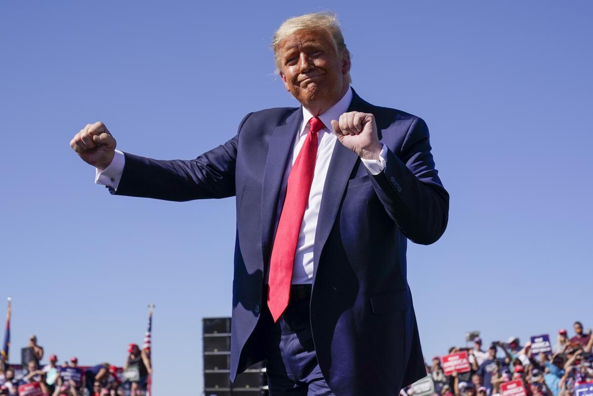 President Trump dances after speaking at a campaign rally in Prescott, Ariz., on Monday. 