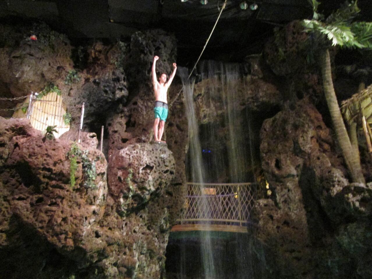 Cliff diver Travis Sims prepares to leap at Casa Bonita. He calls the restaurant "Chuck E. Cheese meets Disneyland." Now in its 40th year, the eccentric Colorado eatery attracts people from around the world.