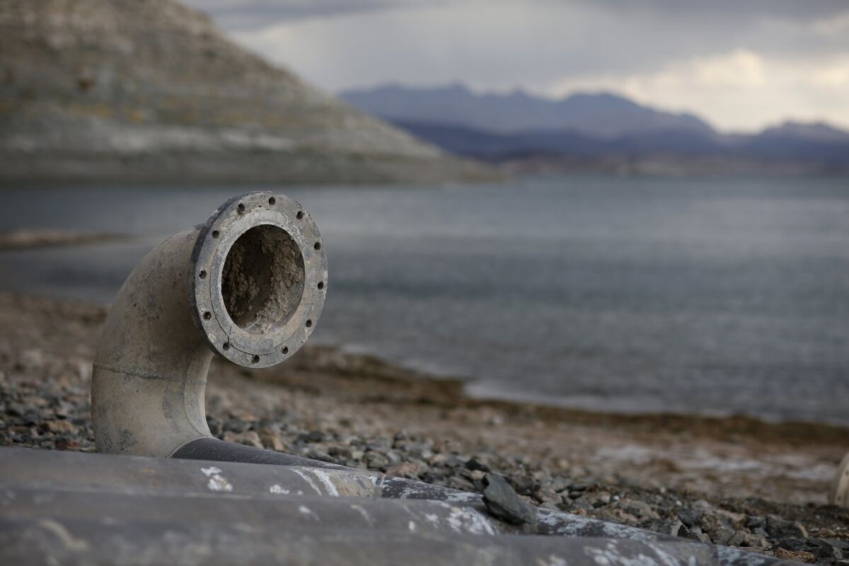 Water intake pipes that were once underwater sit above the water line along Lake Mead in southern Nevada on May 18. For the last several years, drought has persisted in much of the West and the Great Plains.