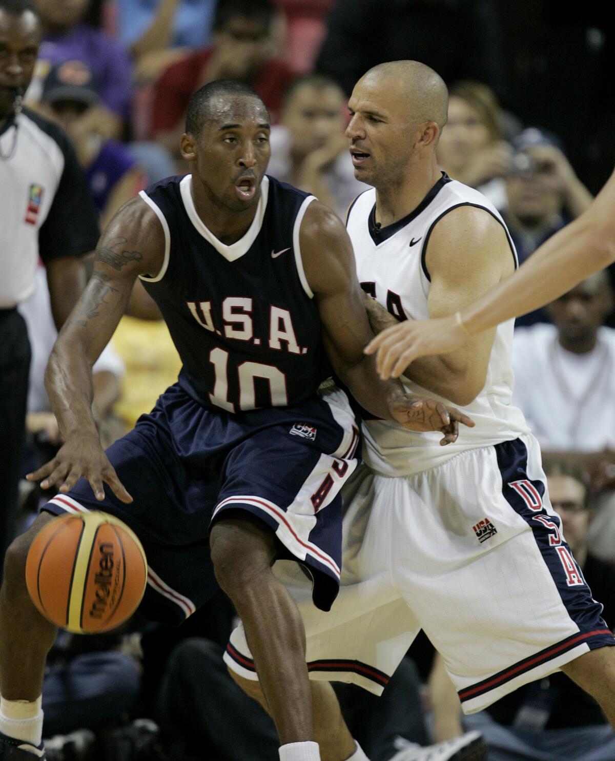 Jason Kidd pressures Kobe Bryant during an Olympic basketball team practice in 2007. (Jae C. Hong / Associated Press) Kobe Bryant makes the last shot of the game over the New Jersey Nets Jason Kidd. (Los Angeles Times)