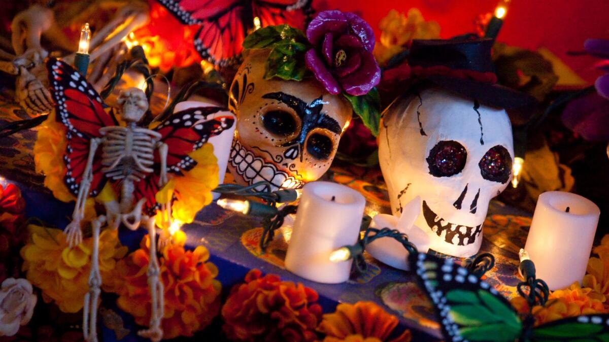 Part of an altar to honor family members who've passed away, on display at an annual Dia De Los Muertos (Day of the Dead) celebration at the Sherman Heights Community Center.