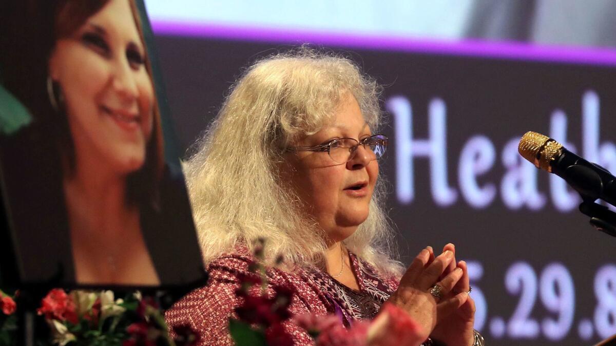 Susan Bro, mother to Heather Heyer, speaks during a memorial for her daughter, Wednesday, Aug. 16, 2017, at the Paramount Theater in Charlottesville, Va. Heyer was killed Saturday, when a car rammed into a crowd of people protesting a white nationalist rally. (Andrew Shurtleff/The Daily Progress via AP, Pool)