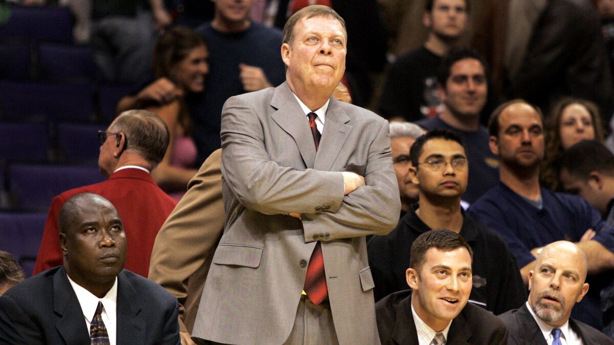 Frank Hamblen watches the Lakers defeat the Portland Trail Blazers on Feb. 1, 2005, during his second game as interim coach.