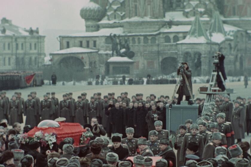 A crowd gathered the casket of Soviet premier Joseph Stalin in Moscow's Red Square.