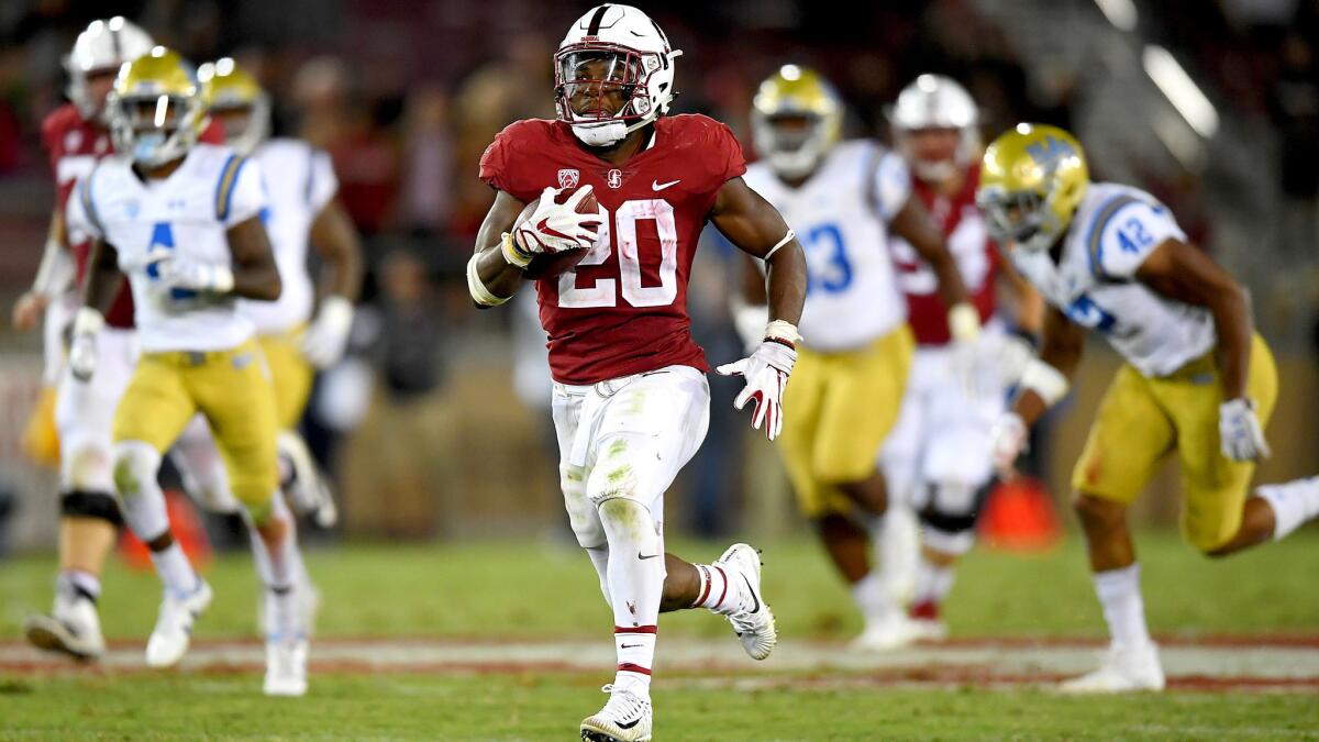 Stanford running back Bryce Love breaks into the clear against UCLA for a 69-yard scoring run to give Stanford a 51-34 lead in the fourth quarter on Sept. 23, 2017.