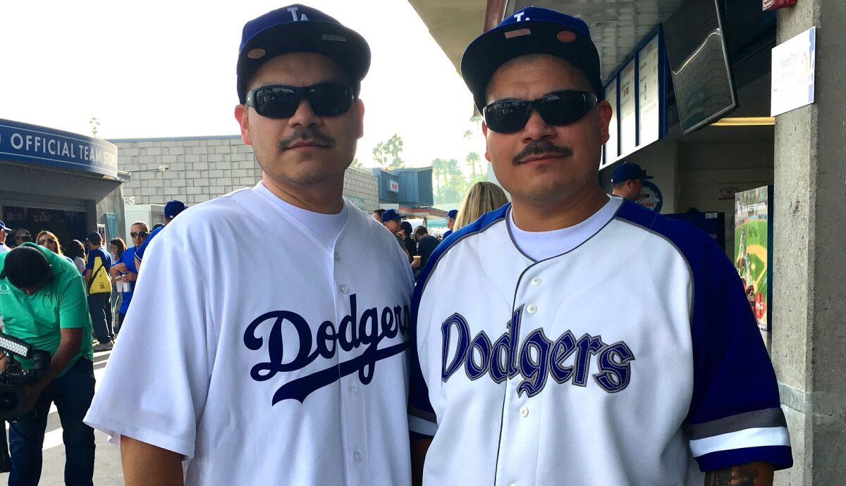 Twin brothers Roger and Danny Martinez made a "once-in-a-lifetime" journey to Dodger Stadium for the World Series on Sunday.