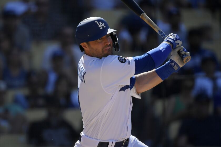 Los Angeles Dodgers' A.J. Pollock bats during a baseball game against the San Diego Padres Sunday, Aug. 4, 2019, in Los Angeles. (AP Photo/Mark J. Terrill)