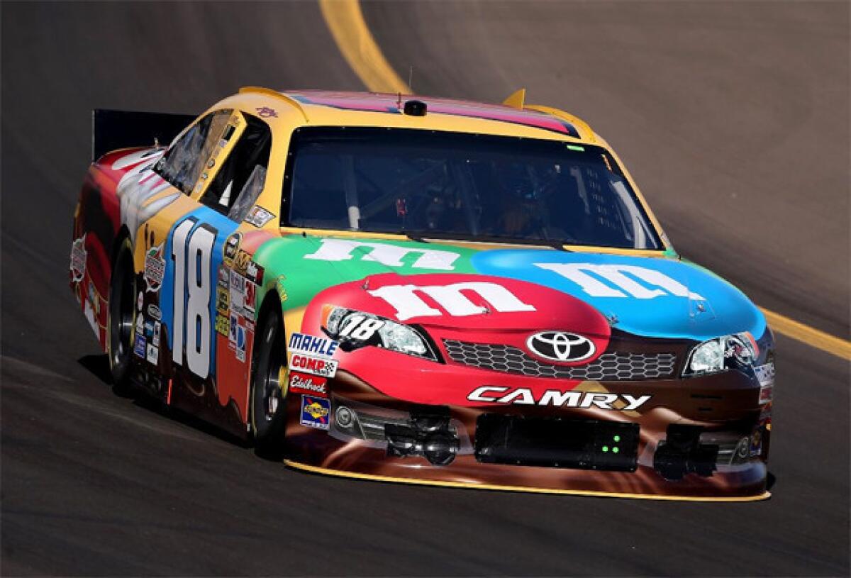 Kyle Busch set a track qualifying record of 138.766 mph to win pole position.