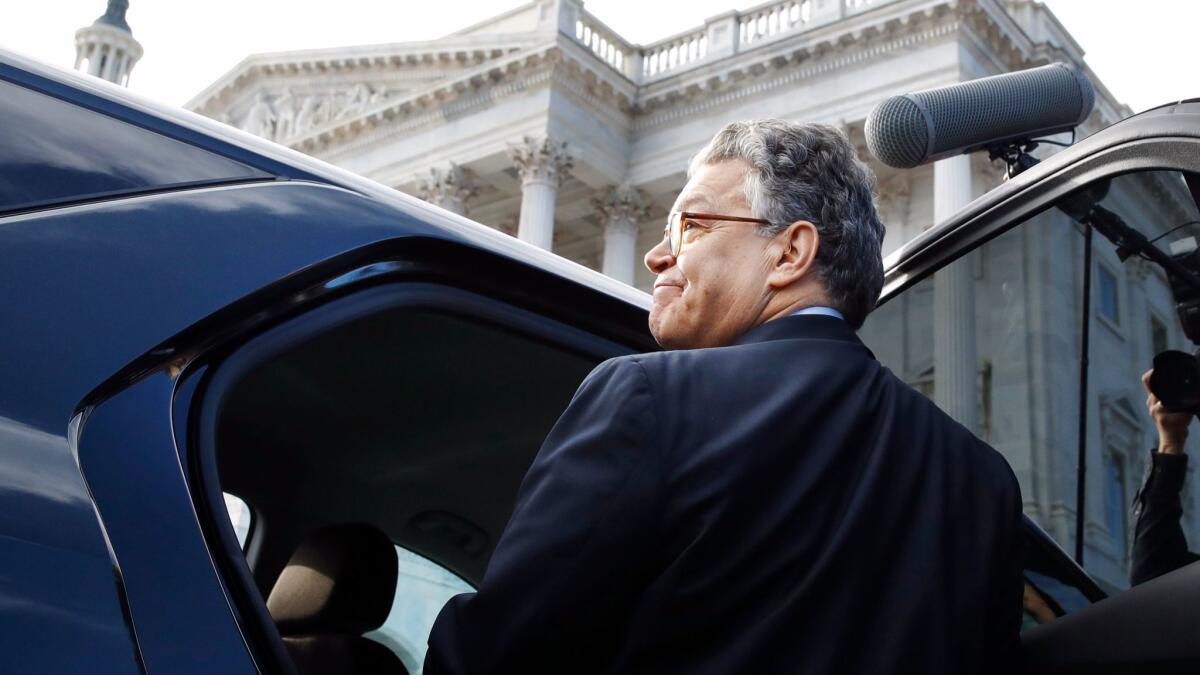 Al Franken leaves Capitol Hill on Thursday after announcing his resignation on the Senate floor.