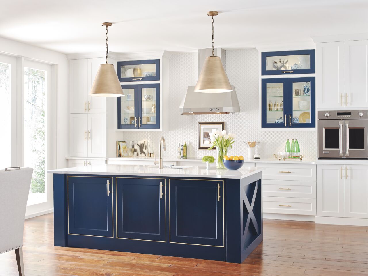 “Pantone’s 2020 Color of the Year, Classic Blue, embodies a casual sophistication that compliments a wide array of other colors, making it a harmonious tone. Masterbrand Cabinets has seen blue kitchen accents making waves in our segment of the market with finishes like Maritime, Naval and Blueberry. It’s optimistic and inviting and pairs naturally with shades of white, gray and trending wood tones. Classic Blue represents a new era that cements deep blues to be an important tool for designers and a confident choice for homeowners.” – Stephanie Pierce, director of design and trends at MasterBrand Cabinets