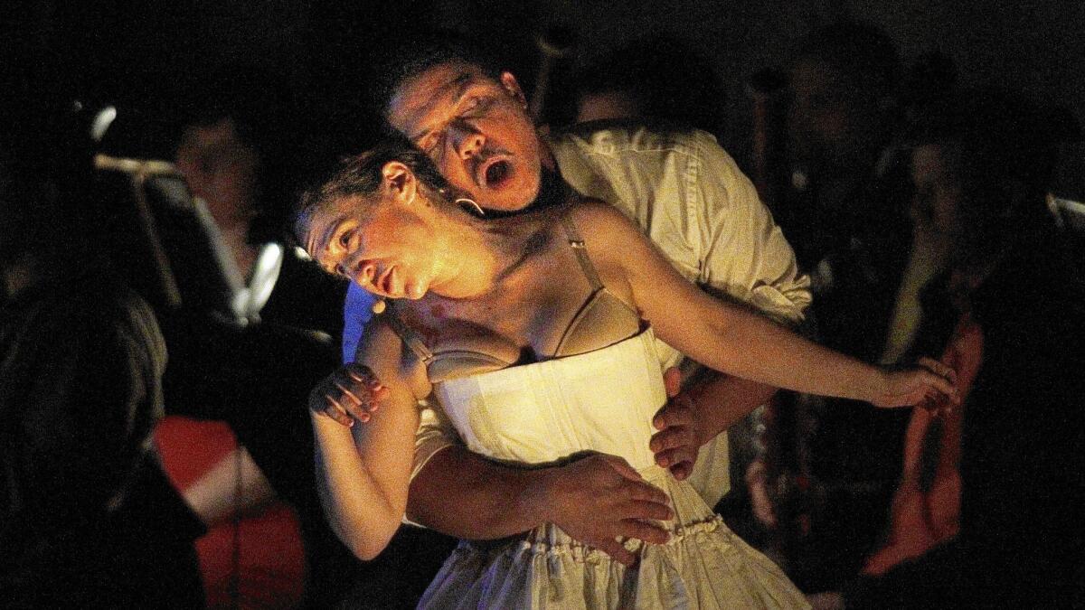 Jennifer Zetlan, soprano, as Mozart/Donna Anna and Aubrey Allicock, bass-baritone as Tonic/Participant 2/Don Giovanni in Steven Stucky's opera "The Classical Style" for the Ojai Festival at Libby Bowl in Ojai.