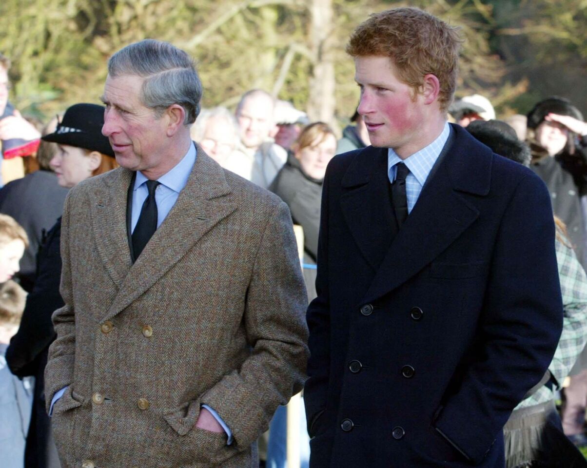 The Prince of Wales with his son Prince Harry