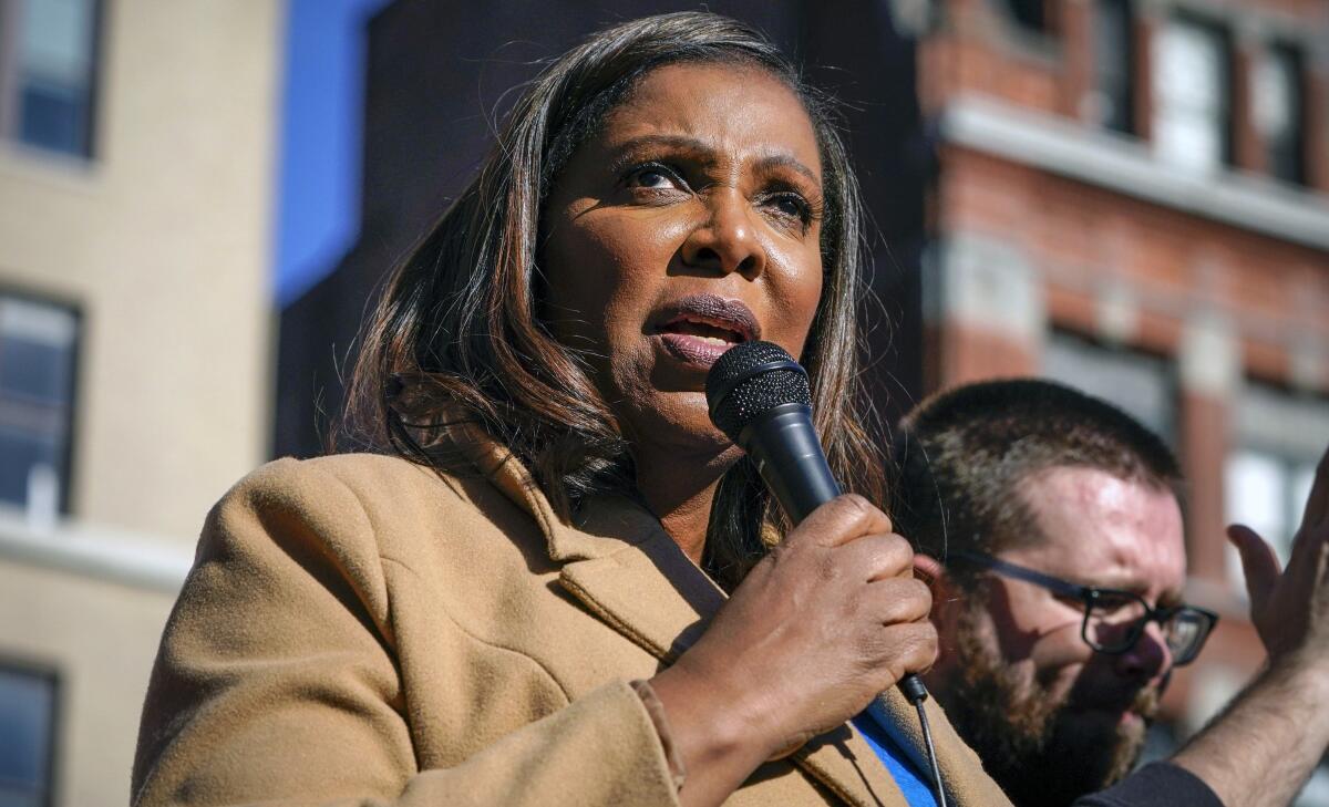 A woman speaks into a microphone.