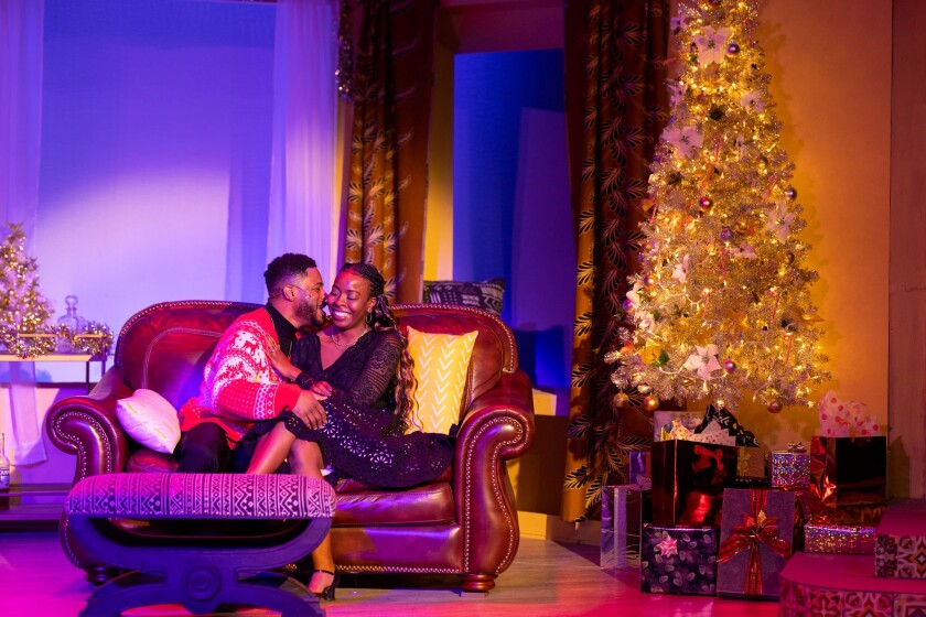 Kory LaQuess Pullam and Deja Fields in "1222 Oceanfront: A Black Family Christmas" at New Village Arts.