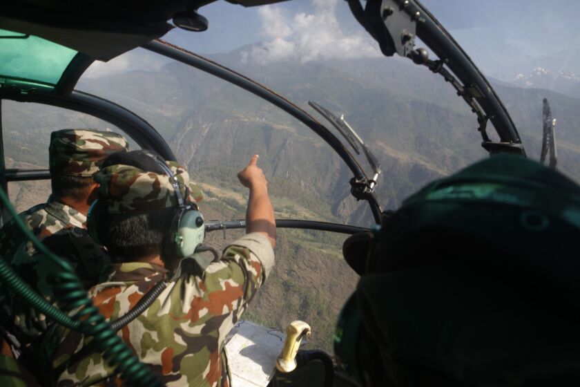 Nepalese soldiers search for a missing U.S. Marine helicopter in the Dolakha district on May 14.