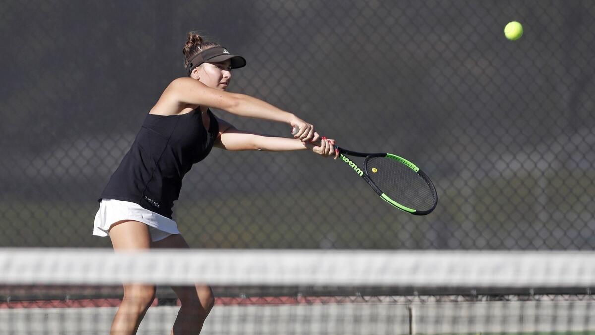 Sage Hill School's Miranda deBruyne plays in a No. 1 doubles set against St. Margaret's during a San Joaquin League match on Tuesday.