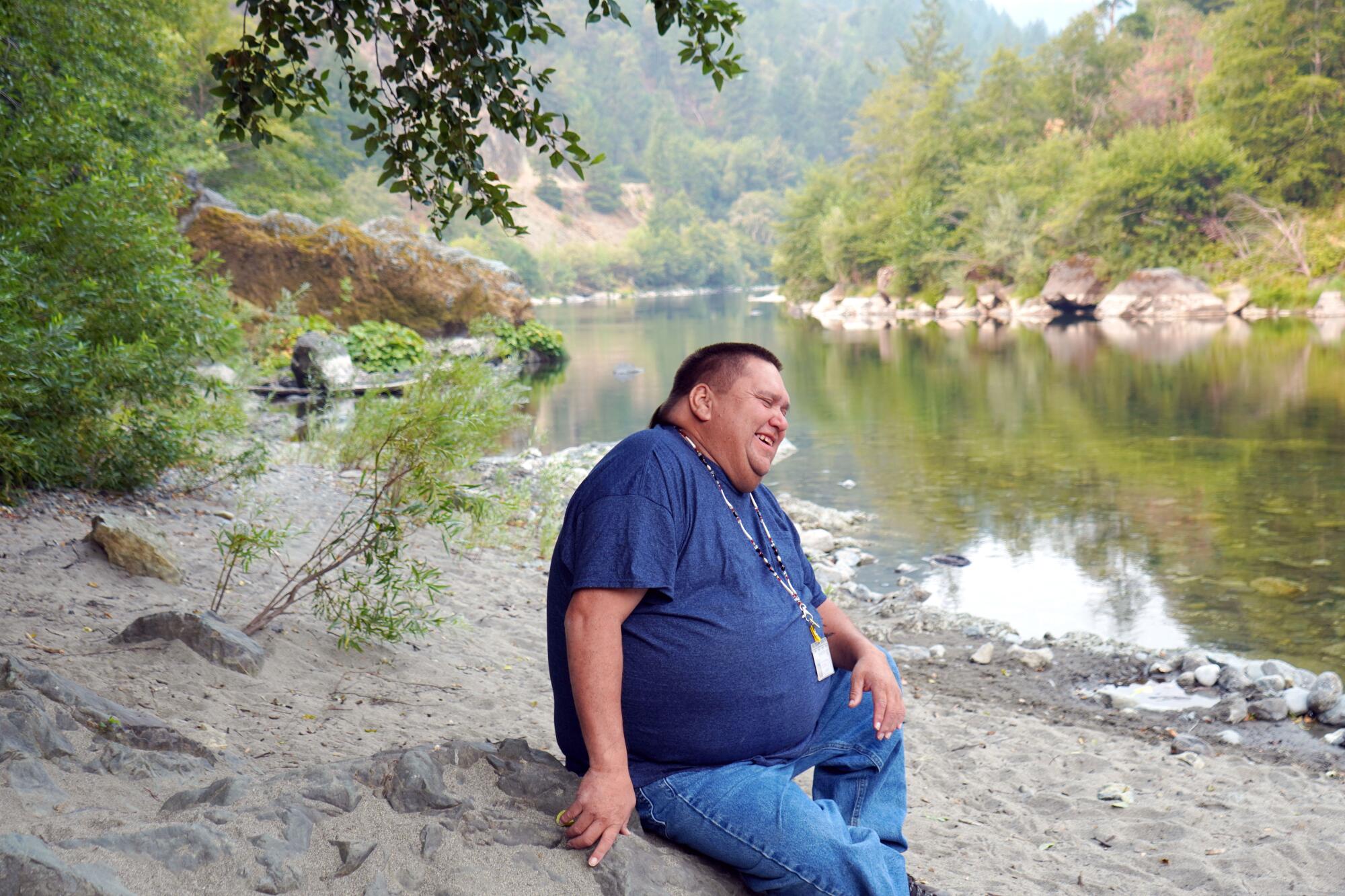 Troy Hockaday, a Karuk tribe member, on a ridgeline overlooking Klamath and Salmon rivers. 