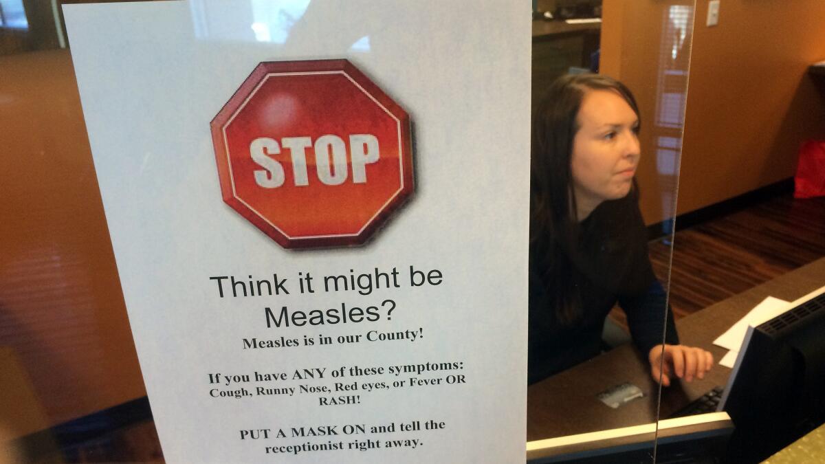 A measles notice at a pediatrician's office in Scottsdale, Ariz. in 2015.