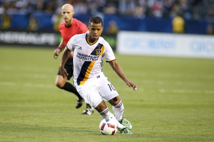 Galaxy forward Giovani dos Santos moves the ball against the Portland Timbers during an April game at StubHub Center.
