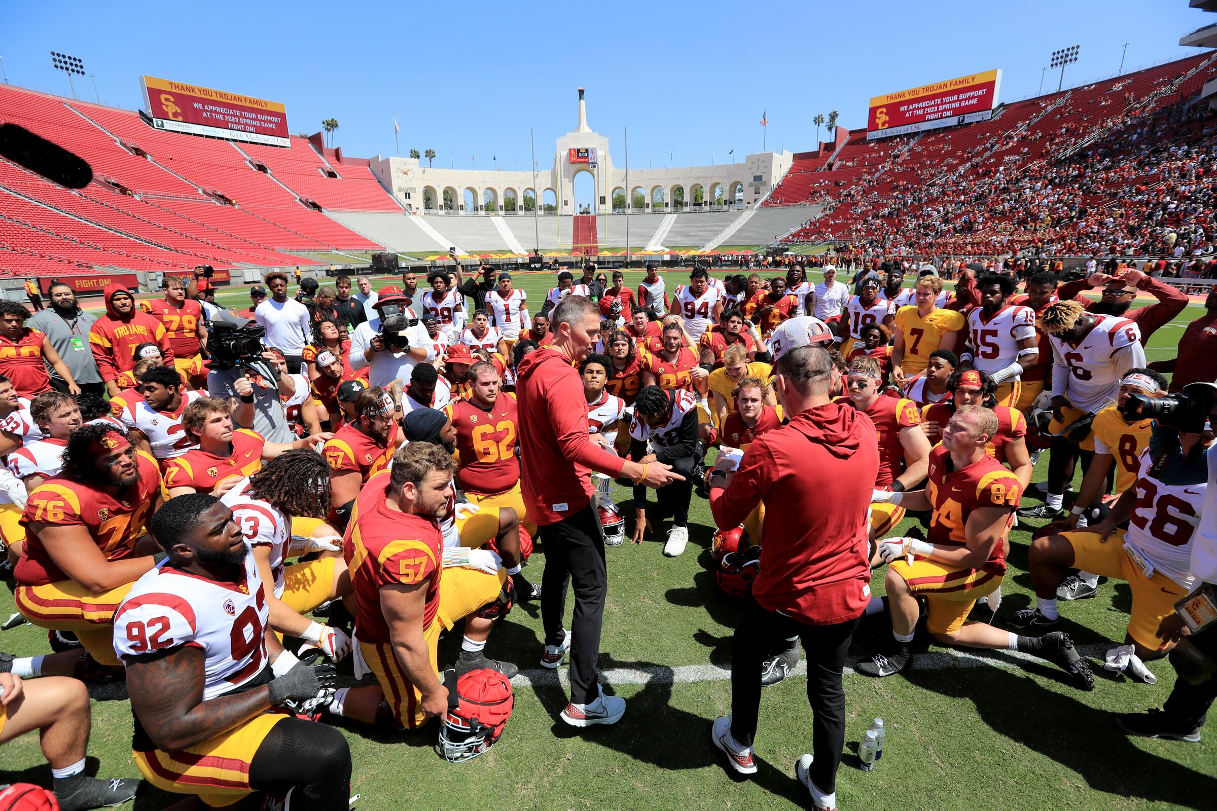 USC coach Lincoln Riley speaks with his team after the Trojans' spring game at the Coliseum in April. 