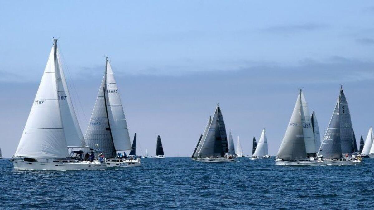 Shadowfax (7187) leads a large group of boats at the start of the PHRF-D class race at the Newport To Ensenada International Yacht Race off Newport Beach on April 26.