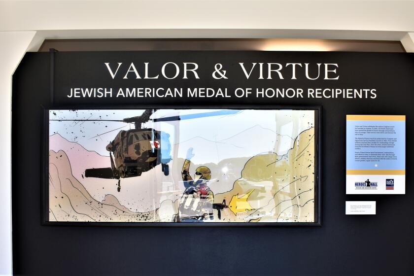A new exhibit at the Heroes Hall veterans museum at the O.C. fairgrounds tells the story of 18 Jewish-Americans Medal of Honor recipients.