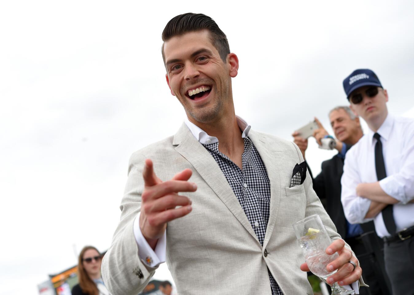 Ravens kicker Justin Tucker in Preakness Village on the day of the 142nd running of the Preakness Stake.