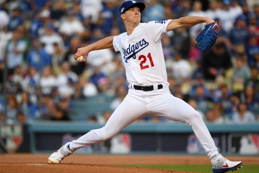 LOS ANGELES, CALIFORNIA - OCTOBER 09: Starting pitcher Walker Buehler #21 of the Los Angeles Dodgers delivers in the first inning of game five of the National League Division Series against the Washington Nationals at Dodger Stadium on October 09, 2019 in Los Angeles, California. (Photo by Harry How/Getty Images)
