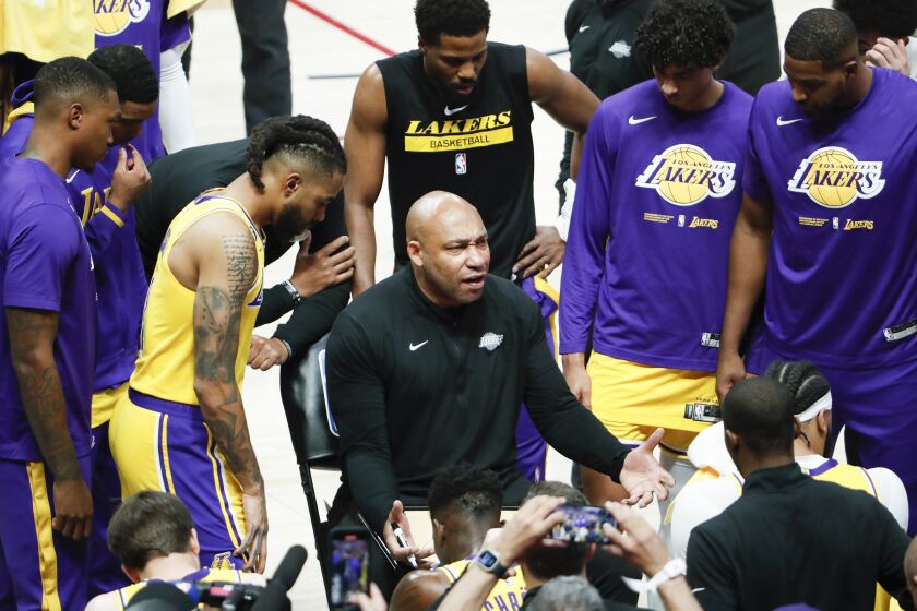 DENVER, CO - MAY 16: Los Angeles Lakers head coach Darvin Ham talks with his team during at time out during the first half of game one in the NBA Playoffs Western Conference Finals against the Denver Nuggets at Ball Arena on Tuesday, May 16, 2023 in Denver, CO. (Robert Gauthier / Los Angeles Times)