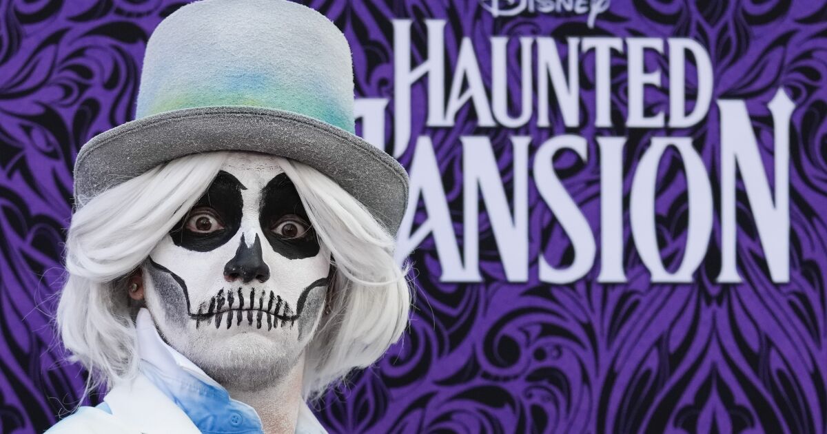 Instead of actors, ‘Haunted Mansion’ premiere haunted by costumed characters, influencers