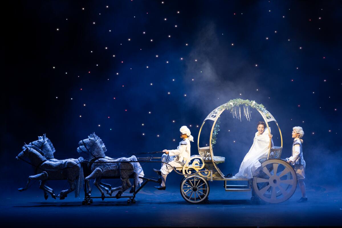 Dhora Da Luz rides her carriage to the ball in Moonlight Stage Productions' "Cinderella" 