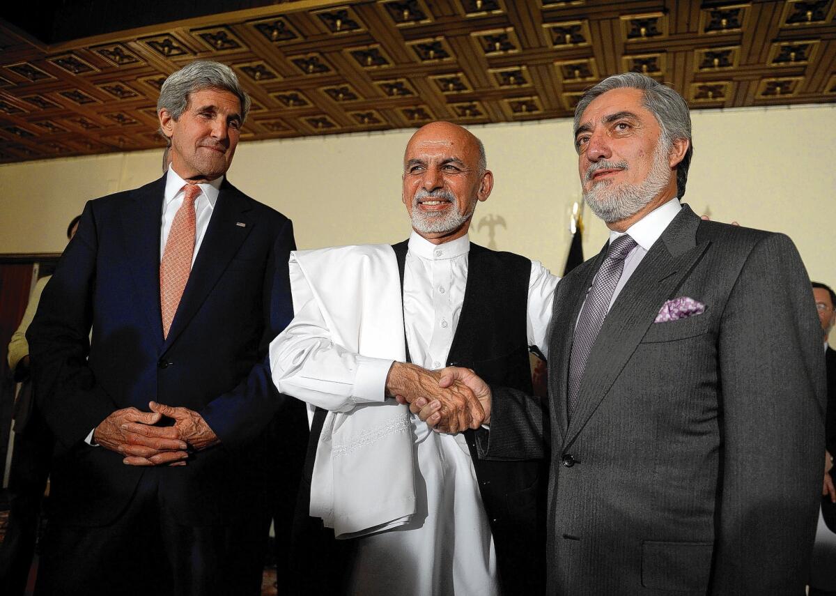 U.S. Secretary of State John F. Kerry, left, has brokered an agreement between Afghan presidential candidates Ashraf Ghani, center, and Abdullah Abdullah to audit the 8 million ballots cast in the recent election and form a unity government