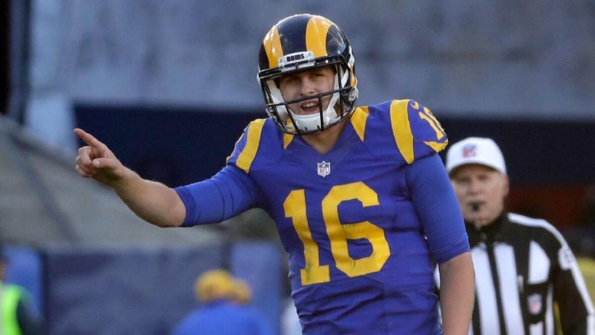 Rams quarterback Jared Goff motions during a Dec. 24 game against the 49ers at the Coliseum.