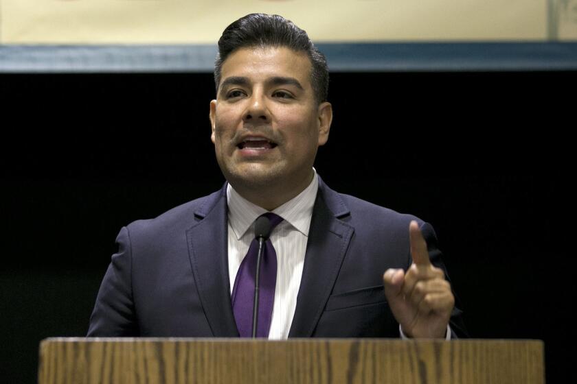 California state Sen. Ricardo Lara, D-Bell Gardens,, calls for passage of his single-payer health care measures at a rally Wednesday, April 26, 2017, in Sacramento, Calif. The bill, SB562 by Lara, and state Sen. Toni Atkins, D-San Diego, would guarantee health coverage with no out-of-pocket costs for all California residents, including people living in the country illegally, is to be heard in the Senate Health Committee on Wednesday. (AP Photo/Rich Pedroncelli)