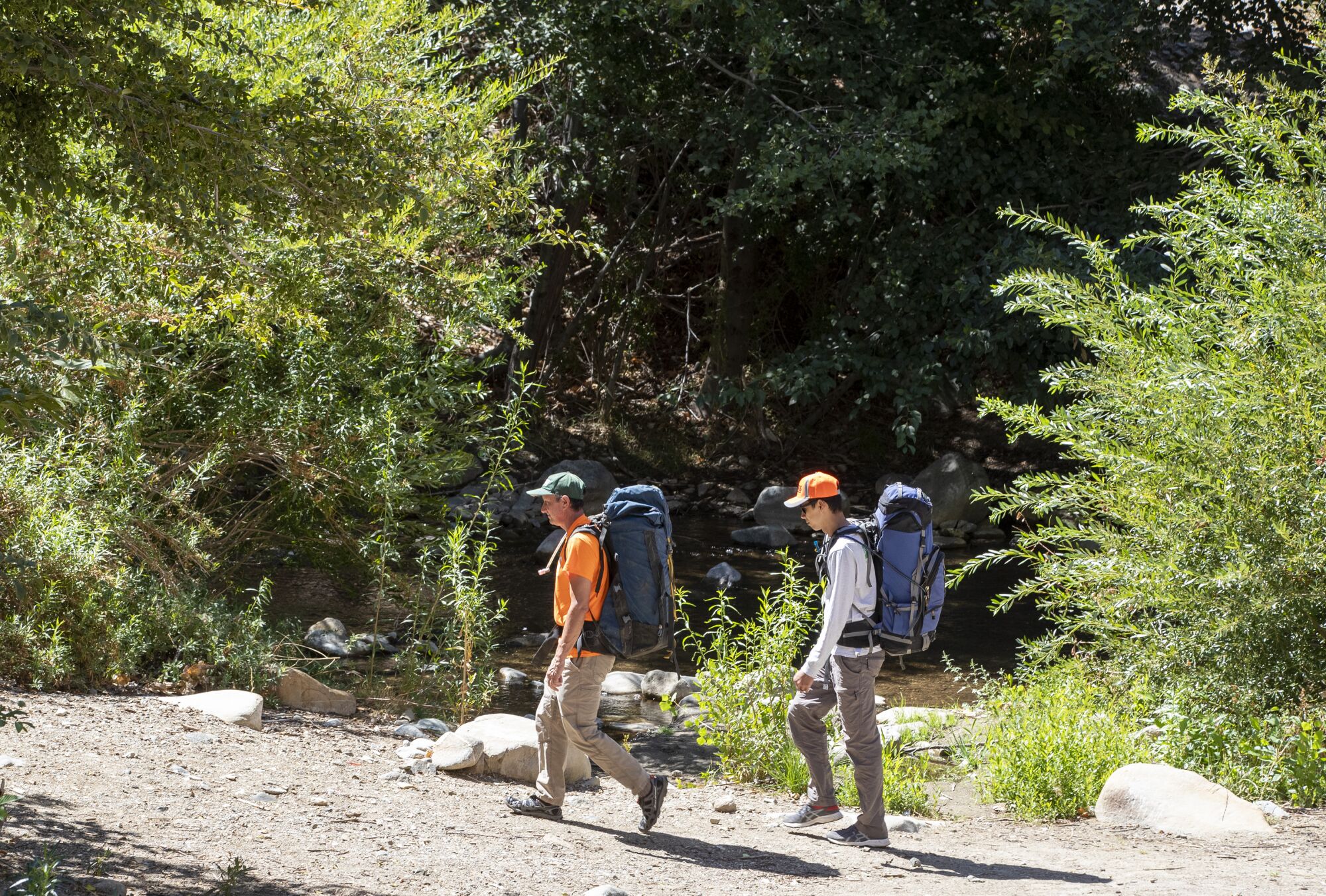Hikers along a creek in the Angeles National Forest