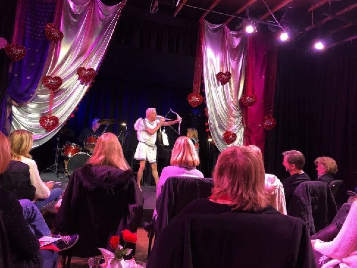 Joe Lauderdale performs as Cupid during an anti-Valentine's Day themed performance at No Square Theatre in Laguna Beach.