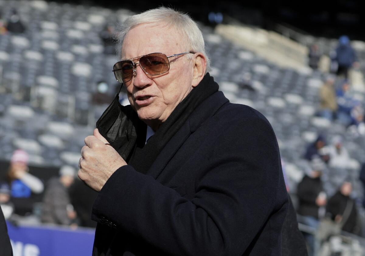 FILE - Dallas Cowboys owner Jerry Jones is seen on the field before an NFL football game between the New York Giants and the Cowboys on Dec. 19, 2021, in East Rutherford, N.J. A 25-year-old Texas woman who sued Jones, alleging he is her biological father, has dropped her lawsuit. Alexandra Davis said in court papers filed Wednesday, April 20, 2022, that she now wants genetic testing to verify her claim, the Dallas Morning News reported.(AP Photo/Corey Sipkin, File)