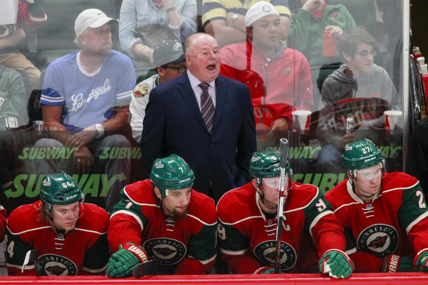 Minnesota Wild Coach Bruce Boudreau yells to his team during the third period of a preseason game against the Carolina Hurricanes on Oct. 2.