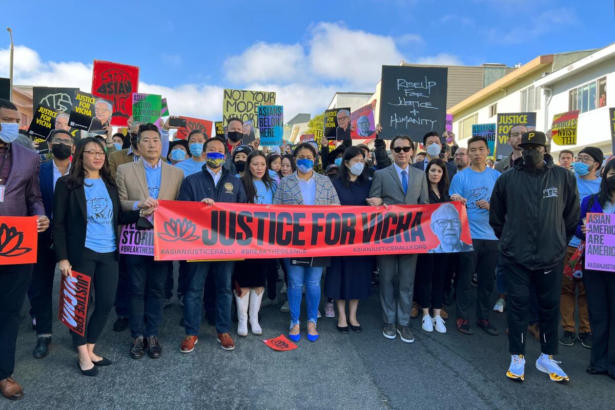 Anti-racism demonstrators holding a banner