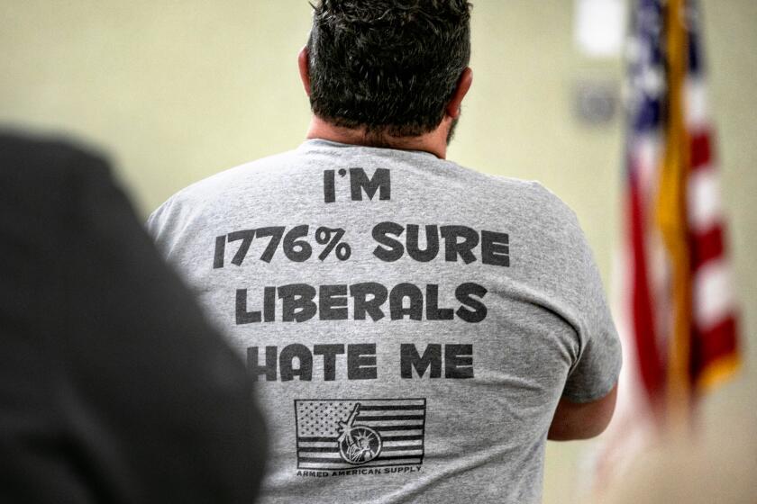 HANFORD, CA - JANUARY 09: People attend a meeting of the 1776 Sons of Liberty at the Hanford Elks Lodge on Monday, Jan. 9, 2023 in Hanford, CA. (Jason Armond / Los Angeles Times)