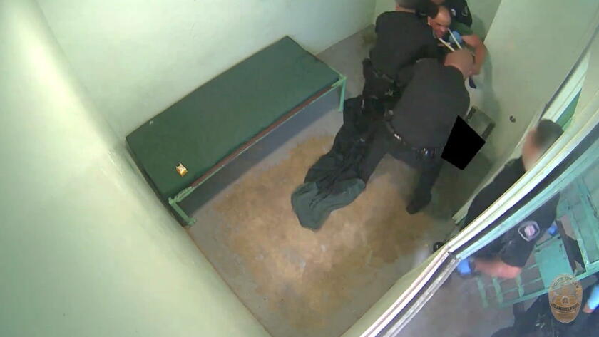 LAPD releases video of officers beating jail inmate who later died LAPD releases video of officers beating jail inmate who later died