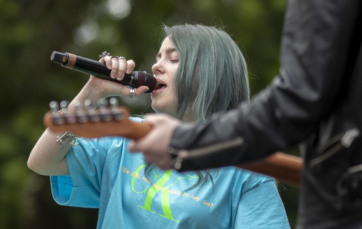 Billie Eilish performs last week for students at Cleveland High School in Reseda.