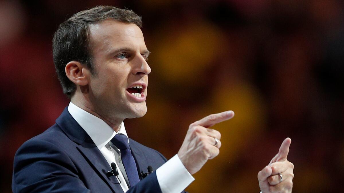 Independent centrist presidential candidate Emmanuel Macron delivers a speech during a meeting in Paris on April 17, 2017.